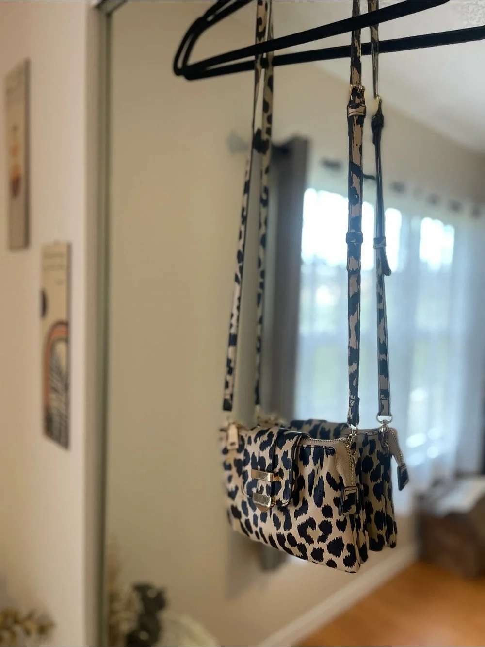 Leopard Print Crossbody Bag with Gold Accent in Black and Cream